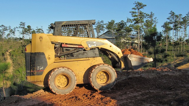 Mini Excavator Working on Septic System Construction